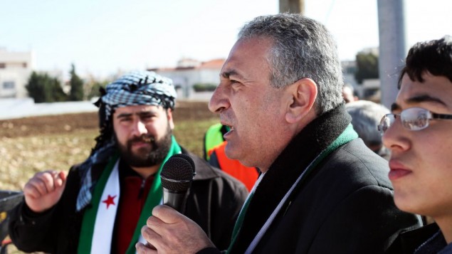 In this Friday, Jan. 6, 2012 photo, Kamal al-Labwani, 54, speaks to a crowd during an anti-Assad rally in Amman, Jordan (photo credit: AP/Mohammad Hannon)