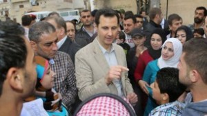Syrian President Bashar Assad, center, speaks with Syrian citizens during his visit to Ain al-Tineh village, near Damascus, Syria, April 20, 2014. (photo credit: AP/SANA) Read more: Israel is our last hope, indicates Syrian dissident | The Times of Israel http://www.timesofisrael.com/israel-is-our-last-hope-indicates-syrian-dissident/#ixzz30MYJLG56 Follow us: @timesofisrael on Twitter | timesofisrael on Facebook